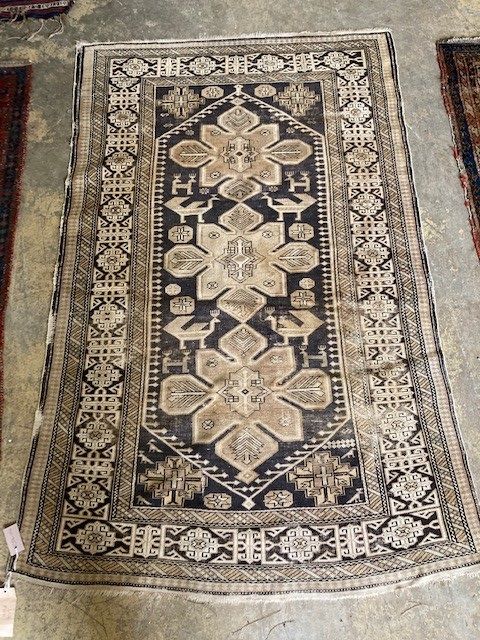 A Shirvan cream rug, 188 x 120cm